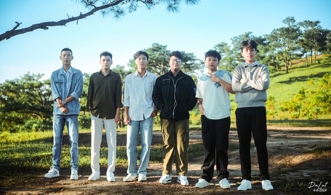 A group of young men standing next to each other