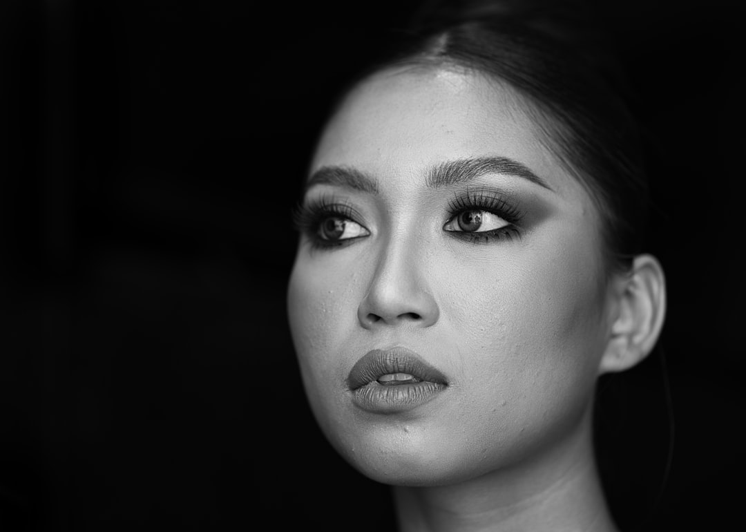 a black and white photo of a woman's face